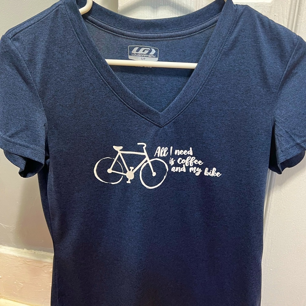 Like new ambiking/workout/brunch shirt. A must have just like an iced coffee.